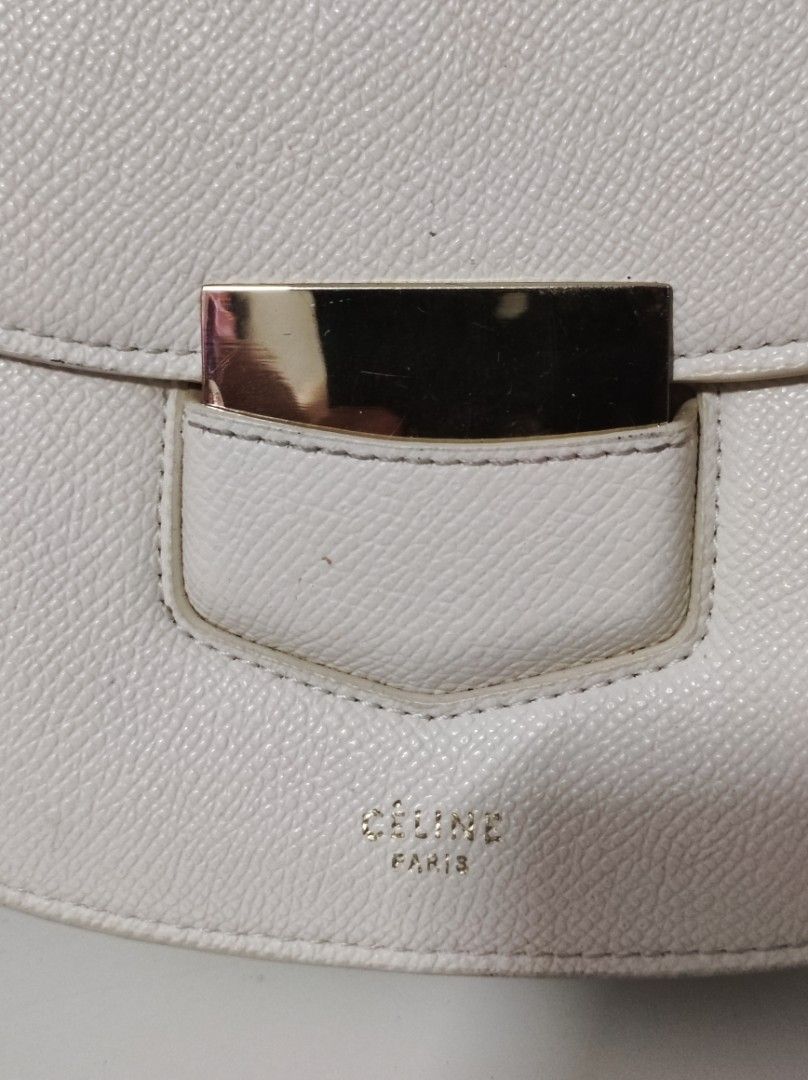 Celine Sling Bag (Category: Luxury Bags & Wallets) located in Santa Rosa. Submitted by sassycollection. (Listing ID 1459091232, Image 3). Description: The Trotteur Crossbody Bag features a leather body, a back exterior slip pocket, an adjustable flat leather strap, a front flap with a slip on closure, and an interior slip pocket. Smooth, elegant lines make the Celine Trotteur bag a joy to look at and to wear. Despite its simple silhouette, the Tr