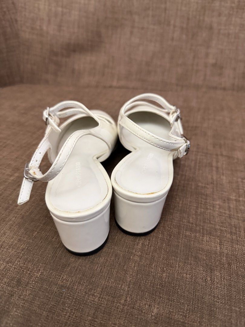 Charles & Keith White Mary Jane Slingback Pumps (Category: Heels) located in Tarlac. Submitted by anotherastrid (Listing ID 1459237798, Image 3). Description: USED ONCE. SA WEDDING. TAMBAK EVER SINCE. - Brand: Charles & Keith - Style: White Mary Jane Slingback Pumps - Size: EU 37 (UK 4 / US 6) - Color: White - Features: Patent finish, adjustable slingback strap with buckle detail - Perfect for: Adding a chic and elegant touch to any outfit Negoti