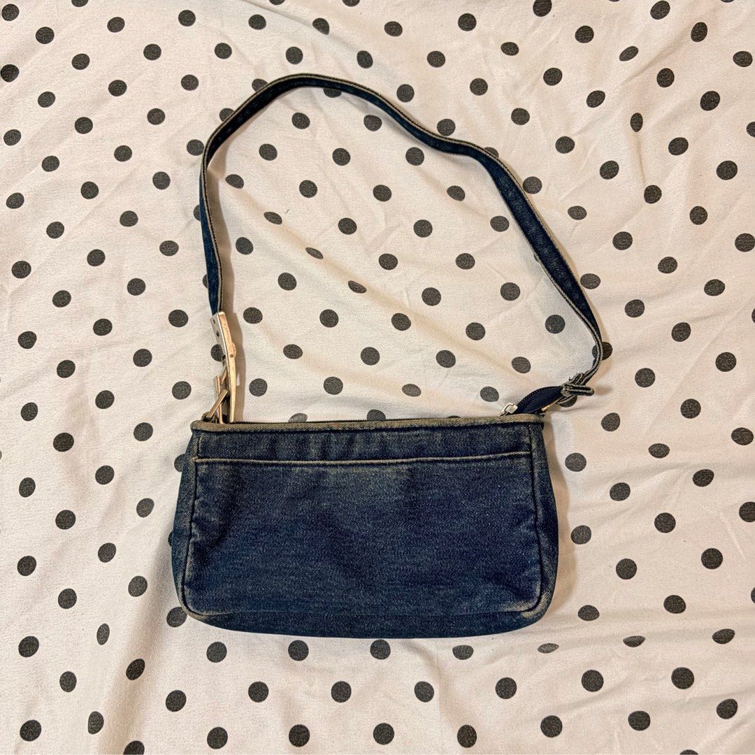 SALE! Chateau Denim Shoulder Bag (Category: Shoulder Bags) located in Pasay City. Submitted by notellyyyy (Listing ID 1459162995, Image 1). Description: - Cute denim shoulder bag from Chateau - Small size, ideal for essentials - Secure zipper closure - Adjustable strap with buckle - Made in China - Perfect for casual outings.