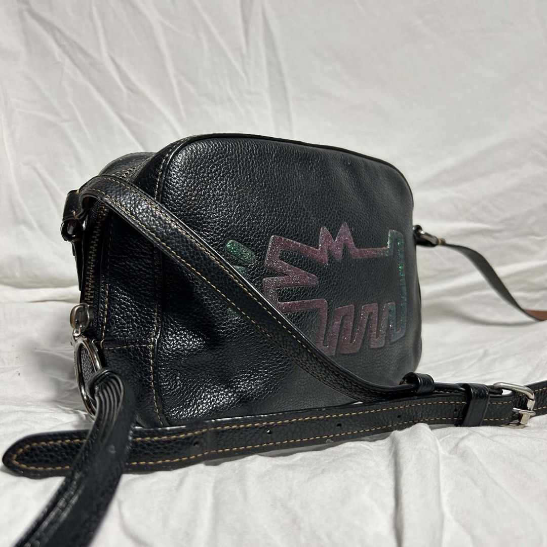 Coach 1941 x Keith Haring Crazy Dog (Category: Luxury Bags & Wallets) located in Quezon City. Submitted by 2h3nji (Listing ID 1459211285, Image 2). Description: Coach 1941 x Keith Haring Crazy Dog Camera Bag Excellent Minimal signs of usage 2,500💵 North Caloocan📍.