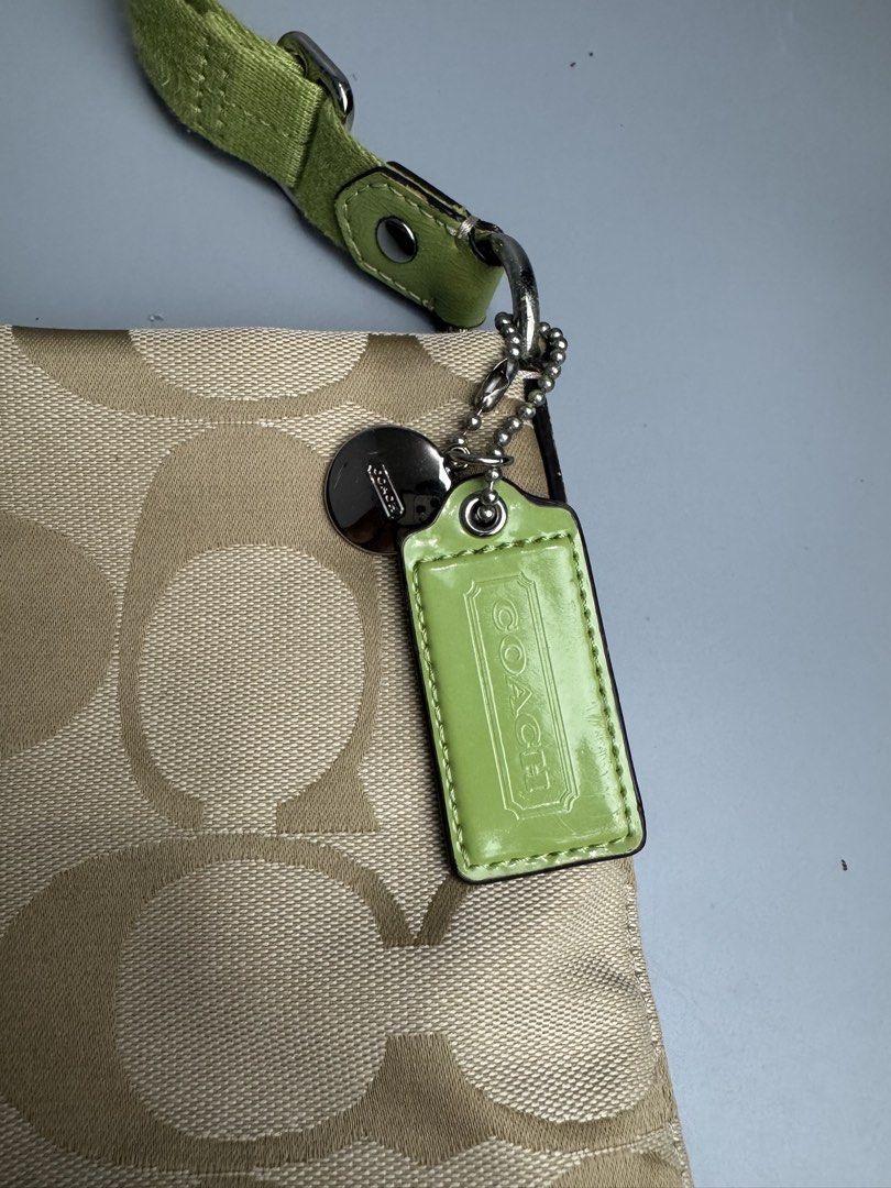 Coach - Monogram C in Khaki/Lime Green (Category: Cross-body Bags) located in San Pablo. Submitted by hiddenrygn (Listing ID 1459217249, Image 2). Description: Coach - Monogram C in Khaki/Lime Green Rank SA Like new condition Guaranteed authentic No major flaws DM! .