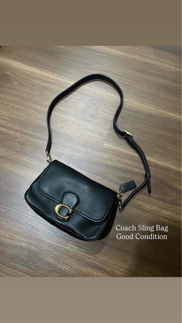 Coach Black Leather Shoulder Bag with Gold Hardware (Category: Luxury Bags & Wallets) located in Bacolod City. Submitted by jmcercado (Listing ID 1459153426, Image 2). Description: - Classic black leather shoulder bag - Features a gold buckle closure on the flap - Adjustable strap with gold hardware - Spacious interior, great for everyday essentials - Clean and well-maintained condition -missing shoulder strap -converted to cross/sling bag.