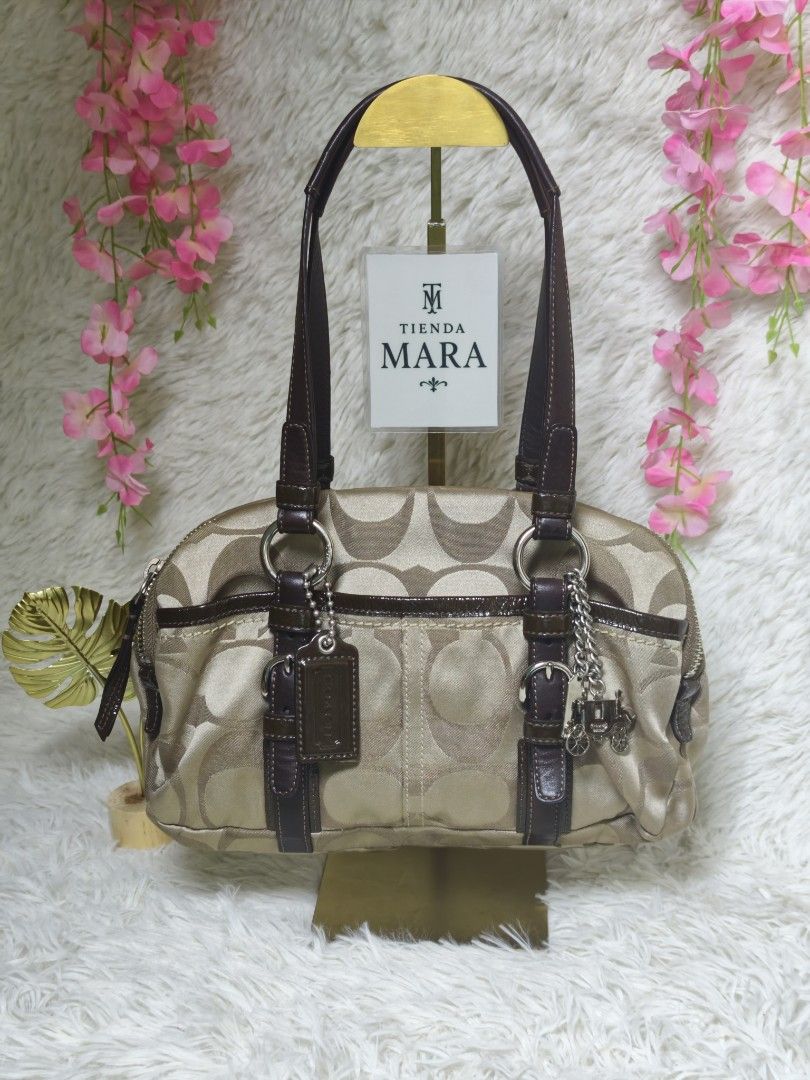 Coach bonnie satchel (Category: Luxury Bags & Wallets) located in Davao. Submitted by tiendamaraj029 (Listing ID 1459222587, Image 1). Description: 👜coach bonnie satchel ✨ Authentic 📸 Actual photos posted ✨ Condition: excellent condition . No runs or tears sa canvas. Leather no cracks or dryness. Malinis inside and out . Lots of compartments. Hardware no tarnish 📌 Flaws: - 💰 Price: ₱14,500 plus shipping ✔Layaway available (full payment gets p