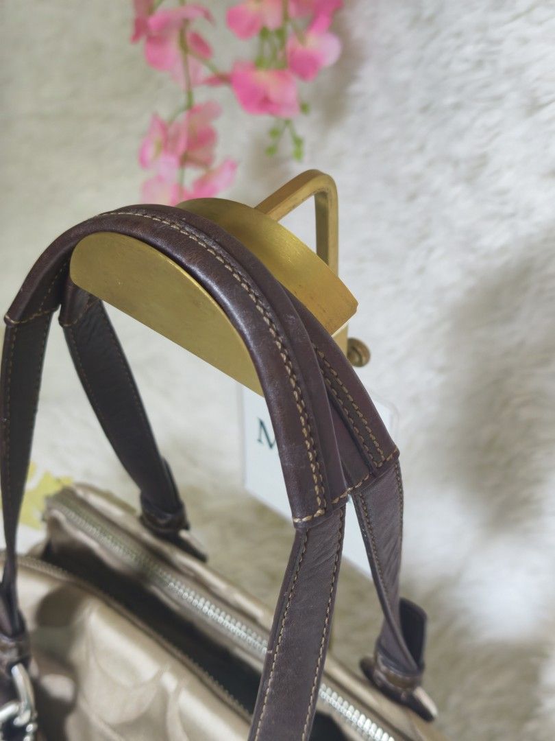 Coach bonnie satchel (Category: Luxury Bags & Wallets) located in Davao. Submitted by tiendamaraj029 (Listing ID 1459222587, Image 2). Description: 👜coach bonnie satchel ✨ Authentic 📸 Actual photos posted ✨ Condition: excellent condition . No runs or tears sa canvas. Leather no cracks or dryness. Malinis inside and out . Lots of compartments. Hardware no tarnish 📌 Flaws: - 💰 Price: ₱14,500 plus shipping ✔Layaway available (full payment gets p