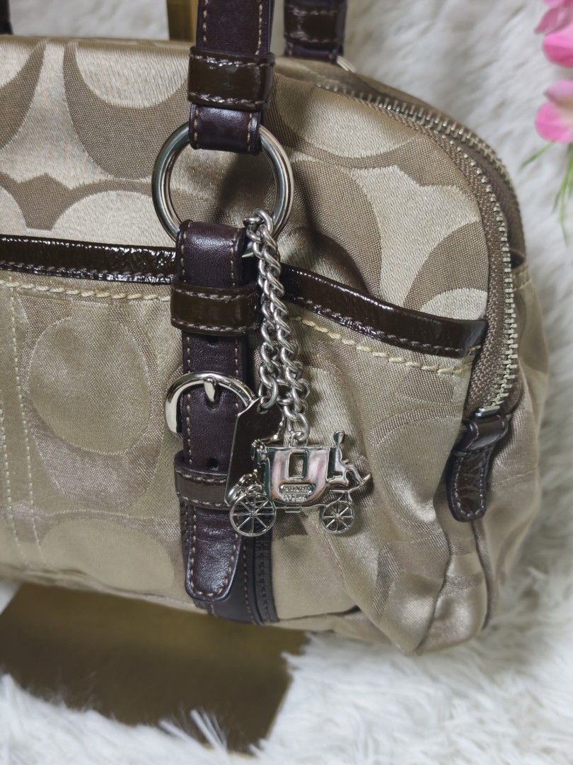 Coach bonnie satchel (Category: Luxury Bags & Wallets) located in Davao. Submitted by tiendamaraj029 (Listing ID 1459222587, Image 3). Description: 👜coach bonnie satchel ✨ Authentic 📸 Actual photos posted ✨ Condition: excellent condition . No runs or tears sa canvas. Leather no cracks or dryness. Malinis inside and out . Lots of compartments. Hardware no tarnish 📌 Flaws: - 💰 Price: ₱14,500 plus shipping ✔Layaway available (full payment gets p