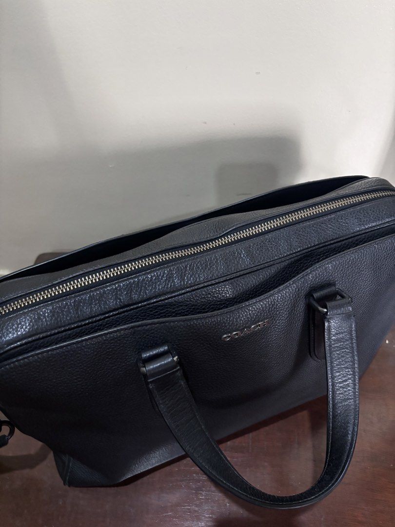 Coach Graham Structured Briefcase (Category: Luxury Bags & Wallets) located in Quezon City. Submitted by knthrift (Listing ID 1459119127, Image 3). Description: Coach Graham Structured Briefcase Pebble Leather • Original Price: ₱22,500 (sale price) • RFS: Upgrading • No dust bag and paper bag • Location: Veterans Village, Quezon City • Available for pick-up only • Send me a PM for a video of the bag.