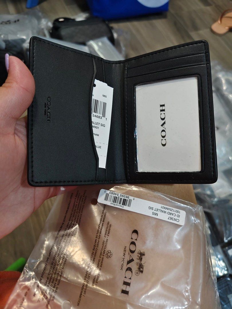 Coach ID Card Wallet Signature (Category: Luxury Bags & Wallets) located in Caloocan City. Submitted by sizzies_fashion_style (Listing ID 1459194308, Image 3). Description: - Authentic Coach ID Card Wallet (Model CW367) - Signature Canvas - Made in Vietnam - Comes with Original Packaging - Multiple Card Slots - Clear ID Window - Perfect for organizing your essentials.