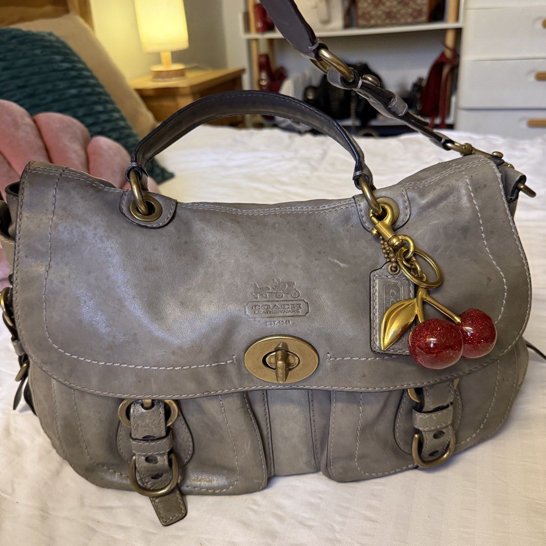Coach Legacy Garcia (Category: Luxury Bags & Wallets) located in Naga. Submitted by fynds.fynds (Listing ID 1459216279, Image 3). Description: ♥ ₱8k ♥ rare piece ♥ gorgeous gray leather, rubber lining intact, comes with hangtag, has leather stains on the body with the major stain covered and hidden by the flap when worn; can be styled as a shoulder bag .