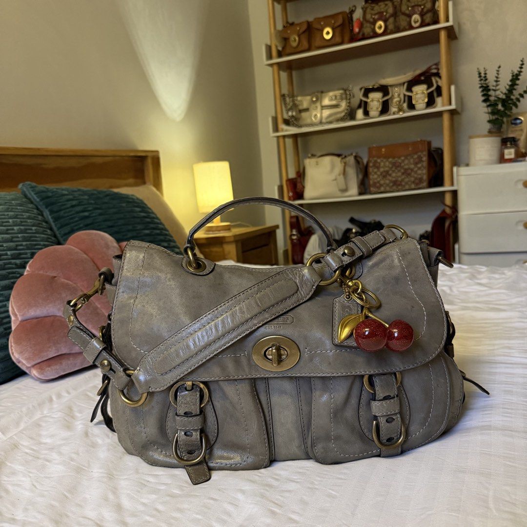 Coach Legacy Garcia (Category: Luxury Bags & Wallets) located in Naga. Submitted by fynds.fynds (Listing ID 1459216279, Image 2). Description: ♥ ₱8k ♥ rare piece ♥ gorgeous gray leather, rubber lining intact, comes with hangtag, has leather stains on the body with the major stain covered and hidden by the flap when worn; can be styled as a shoulder bag .