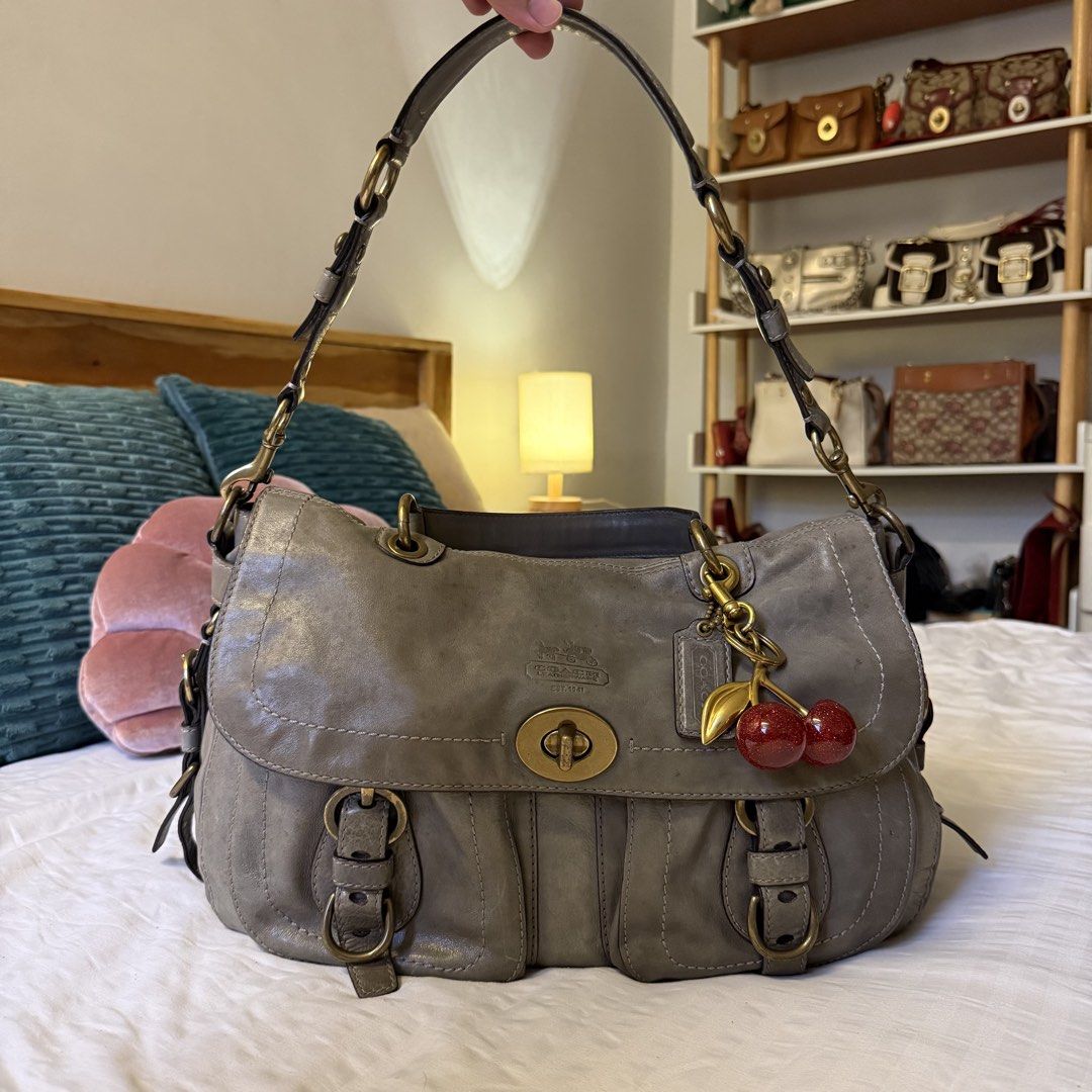 Coach Legacy Garcia (Category: Luxury Bags & Wallets) located in Naga. Submitted by fynds.fynds (Listing ID 1459216279, Image 1). Description: ♥ ₱8k ♥ rare piece ♥ gorgeous gray leather, rubber lining intact, comes with hangtag, has leather stains on the body with the major stain covered and hidden by the flap when worn; can be styled as a shoulder bag .