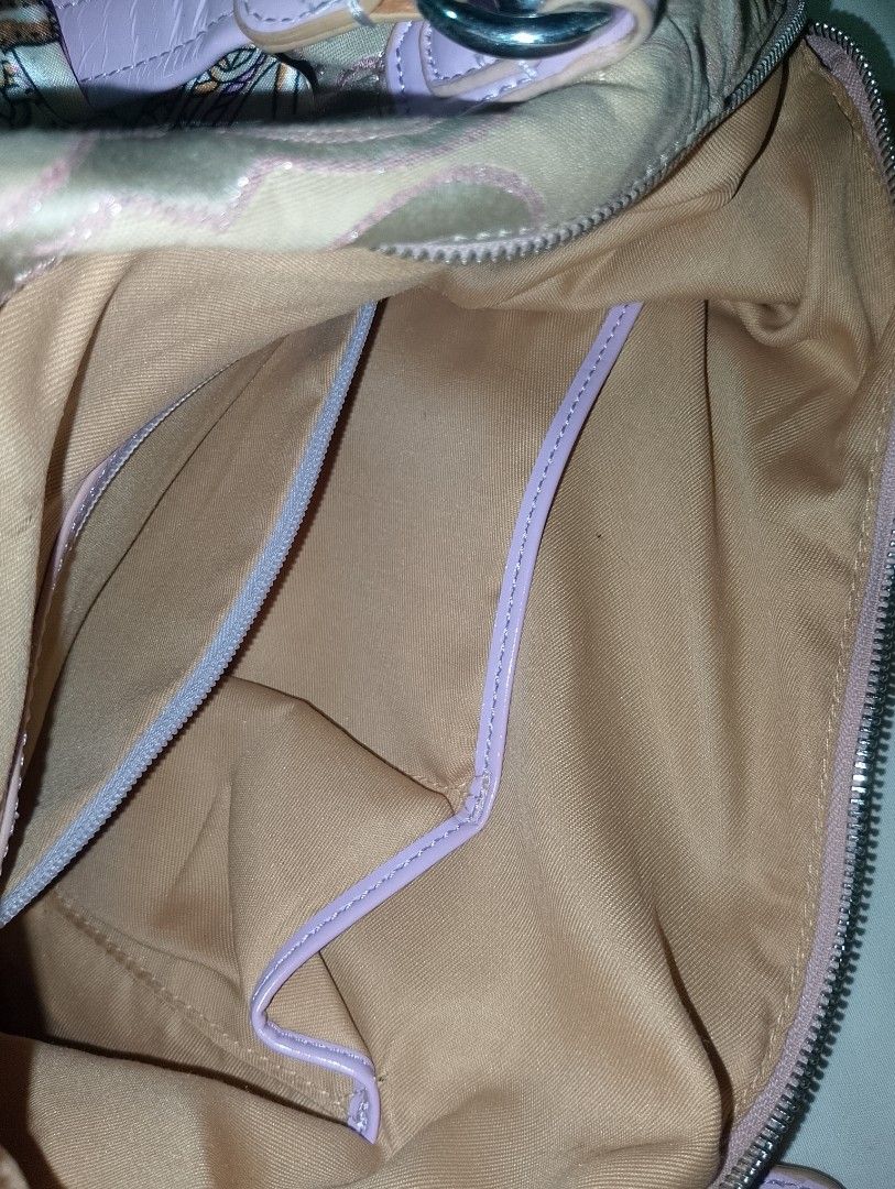 Coach Poppy Shoulder Bag (Category: Shoulder Bags) located in Manila. Submitted by enaxz (Listing ID 1459228784, Image 3). Description: 🎀 nga, please manage your expectations 🎀 has some minor issues (see the last slide) 🎀 spacious, can fit 11 inch ipad perfect for those girlies who love pink bags~ <3.