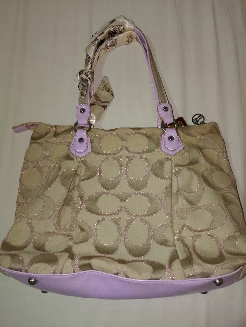 Coach Poppy Shoulder Bag (Category: Shoulder Bags) located in Manila. Submitted by enaxz (Listing ID 1459228784, Image 2). Description: 🎀 nga, please manage your expectations 🎀 has some minor issues (see the last slide) 🎀 spacious, can fit 11 inch ipad perfect for those girlies who love pink bags~ <3.