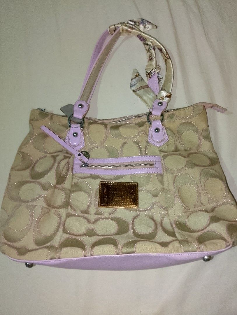Coach Poppy Shoulder Bag (Category: Shoulder Bags) located in Manila. Submitted by enaxz (Listing ID 1459228784, Image 1). Description: 🎀 nga, please manage your expectations 🎀 has some minor issues (see the last slide) 🎀 spacious, can fit 11 inch ipad perfect for those girlies who love pink bags~ <3.