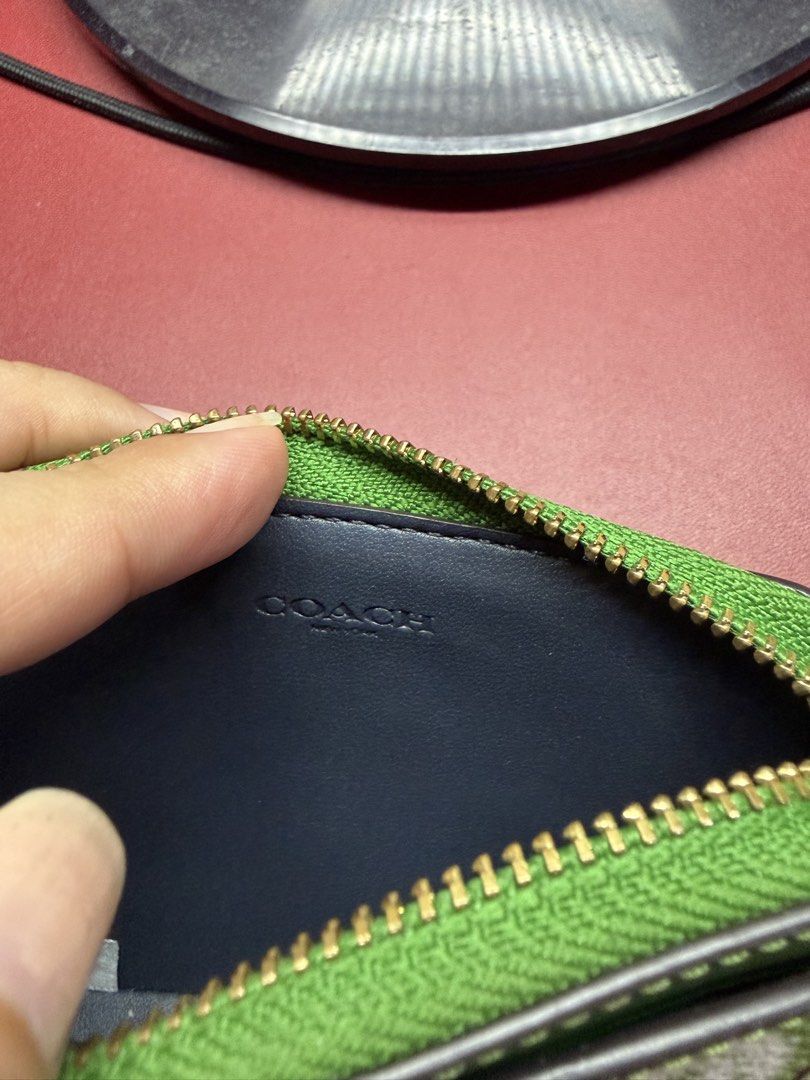 Coach Zip Card Case (Category: Wallets & Card holders) located in Makati City. Submitted by cecebeh (Listing ID 1459166216, Image 3). Description: Authentic. Bought in the US. No inclusions. Actual photos are posted. Rfs: decluttering.