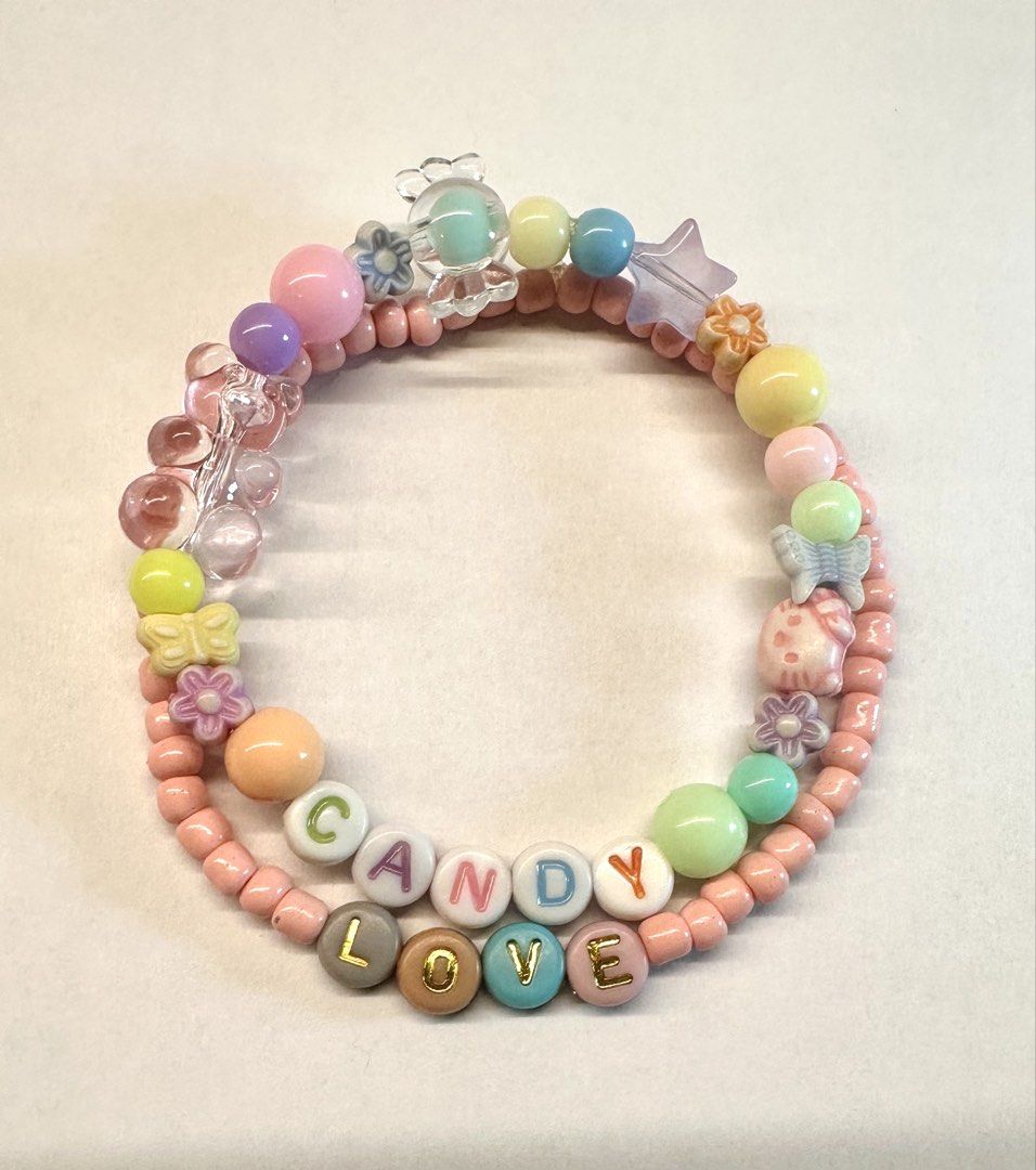 Colorful Decora Beaded Bracelets (Category: Bracelets) located in Manila. Submitted by urlocal_seller (Listing ID 1459187553, Image 1). Description: - Adorable handmade beaded bracelets - Two designs: "candy" and "love" - Adorned with pastel beads - Features cute flower, butterfly, and star charms - Stretchy and comfortable for all-day wear - Adds a fun pop of color to any outfit - Decora and kawaii vibes - Ideal for gifting or a personal treat -