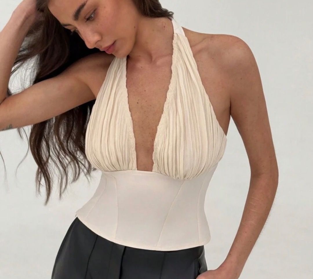 Cream Pleated Halter Neck Ruched Top (Category: Sleeveless) located in Pasig City. Submitted by material_gworI (Listing ID 1459198470, Image 1). Description: .