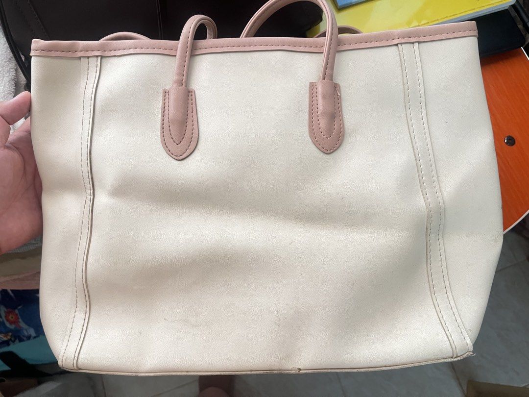 Cream Tote Bag with Pink Trim (Category: Tote Bags) located in Zamboanga. Submitted by sparklepops (Listing ID 1459136039, Image 1). Description: - Cream colored tote bag - Light pink trim and handles - Simple, everyday design - Spacious interior for essentials.
