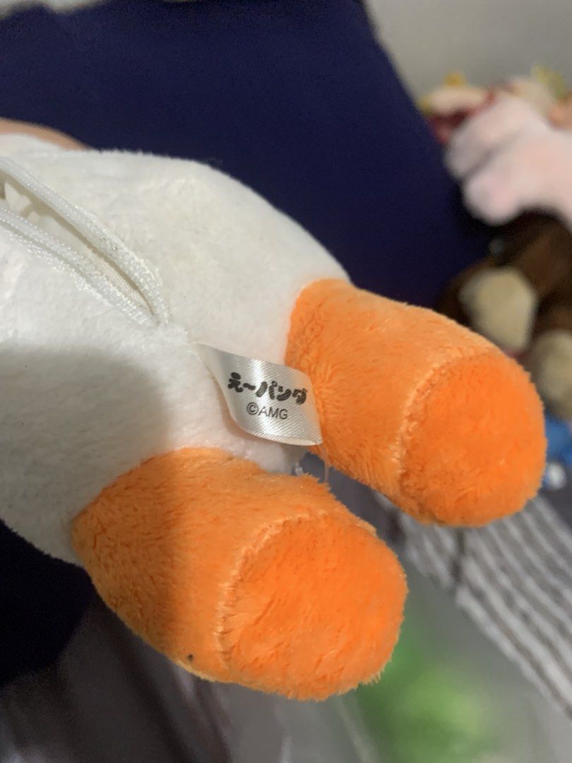 Cute Panda Plush Toy with Zipper (Category: Plushies & Soft Toys) located in Pasig City. Submitted by miswatamita (Listing ID 1459181057, Image 3). Description: Sale ! - Adorable white and orange panda plush toy. - Features a convenient zipper on the back. - Includes a clip for easy hanging. - Ideal accessory for bags, backpacks, or keys. - Tag reads "え～パンダ AMG"..