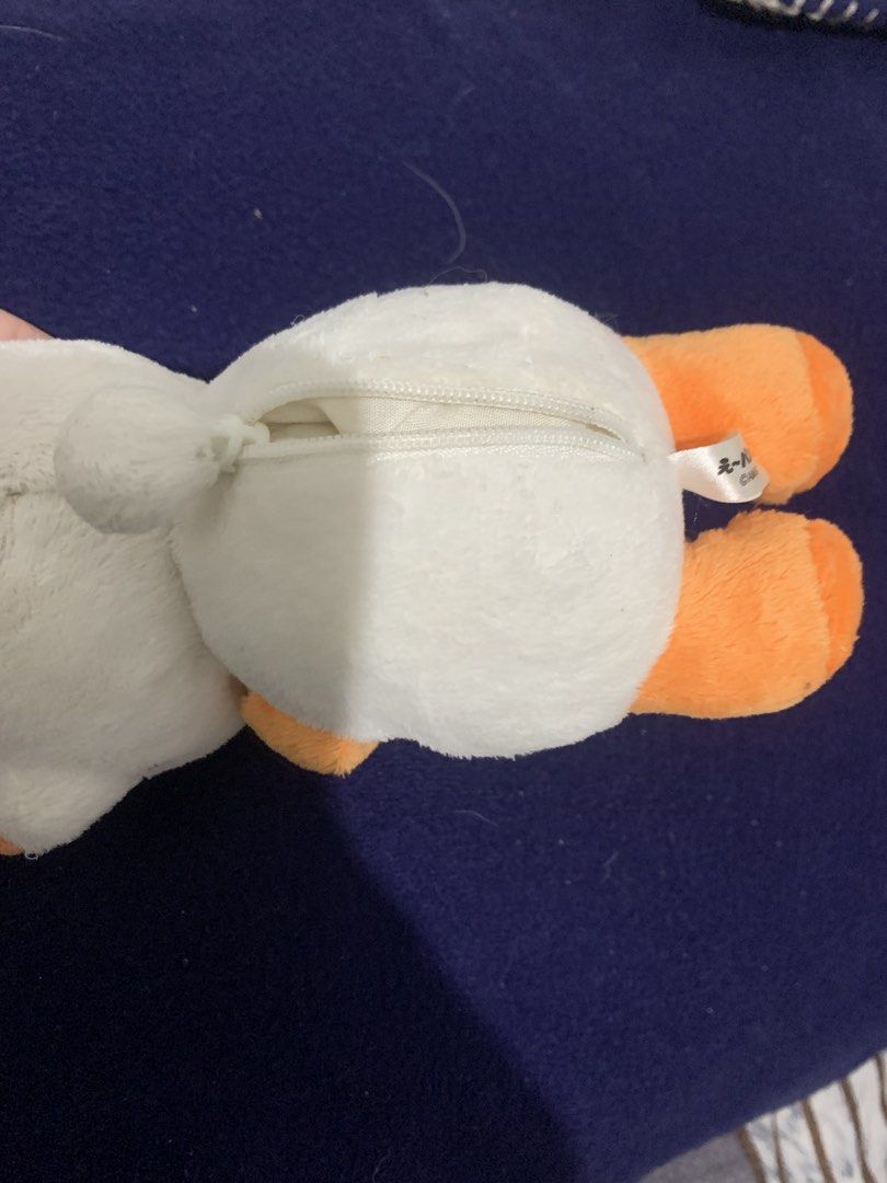 Cute Panda Plush Toy with Zipper (Category: Plushies & Soft Toys) located in Pasig City. Submitted by miswatamita (Listing ID 1459181057, Image 2). Description: Sale ! - Adorable white and orange panda plush toy. - Features a convenient zipper on the back. - Includes a clip for easy hanging. - Ideal accessory for bags, backpacks, or keys. - Tag reads "え～パンダ AMG"..