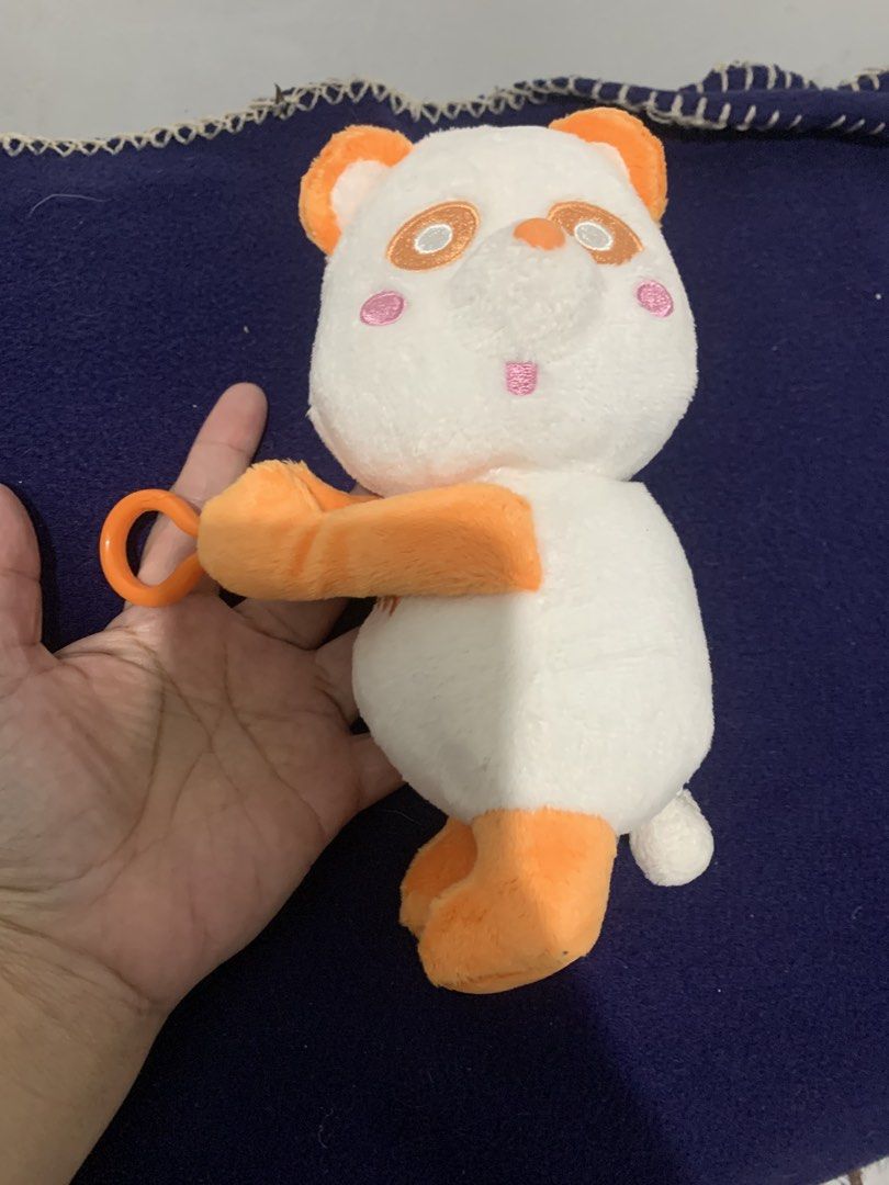 Cute Panda Plush Toy with Zipper (Category: Plushies & Soft Toys) located in Pasig City. Submitted by miswatamita (Listing ID 1459181057, Image 1). Description: Sale ! - Adorable white and orange panda plush toy. - Features a convenient zipper on the back. - Includes a clip for easy hanging. - Ideal accessory for bags, backpacks, or keys. - Tag reads "え～パンダ AMG"..