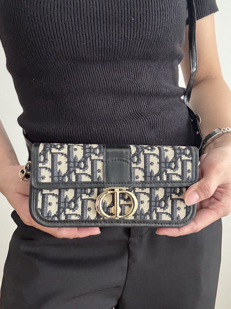 D Oblique Canvas Phone Bag (Category: Luxury Bags & Wallets) located in Taguig. Submitted by ilovetradra (Listing ID 1459097707, Image 1). Description: - Small size, ideal for essentials - Versatile wear: crossbody or shoulder - Clean interior - A timeless fashion statement.