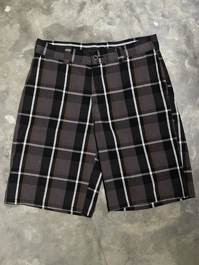 Dickies Plaid Shorts (Category: Shorts) located in Manila. Submitted by u_for_u (Listing ID 1459240937, Image 2). Description: ₱: 420 W: 30-32 / L: 21 Condition: 10/10 Issue/s: N/A Location: Santa Cruz, Manila. - Dickies brown, black and white plaid shorts - Classic fit with belt loops and pockets - Plaid pattern with white and brown accents - Button and zip front closure - Ideal for casual wear.
