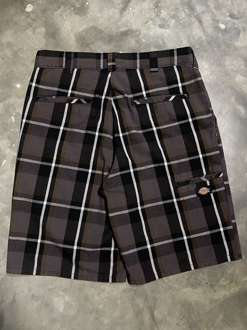 Dickies Plaid Shorts (Category: Shorts) located in Manila. Submitted by u_for_u (Listing ID 1459240937, Image 1). Description: ₱: 420 W: 30-32 / L: 21 Condition: 10/10 Issue/s: N/A Location: Santa Cruz, Manila. - Dickies brown, black and white plaid shorts - Classic fit with belt loops and pockets - Plaid pattern with white and brown accents - Button and zip front closure - Ideal for casual wear.