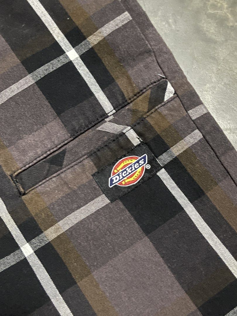 Dickies Plaid Shorts (Category: Shorts) located in Manila. Submitted by u_for_u (Listing ID 1459240937, Image 3). Description: ₱: 420 W: 30-32 / L: 21 Condition: 10/10 Issue/s: N/A Location: Santa Cruz, Manila. - Dickies brown, black and white plaid shorts - Classic fit with belt loops and pockets - Plaid pattern with white and brown accents - Button and zip front closure - Ideal for casual wear.