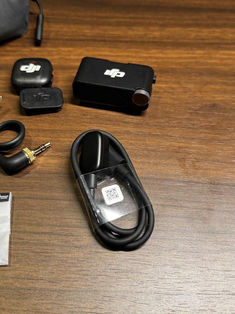 DJI Mic 3 (1 TX + 1 RX) (Category: Microphones) located in Mandaluyong City. Submitted by mjpinedatv (Listing ID 1459224522, Image 3). Description: - DJI Mic wireless microphone system - Includes transmitter, receiver, and charging case - Comes with furry windscreen and USB-C to USB-C cable - Perfect for crystal-clear audio recording - All items neatly stored in the charging case.