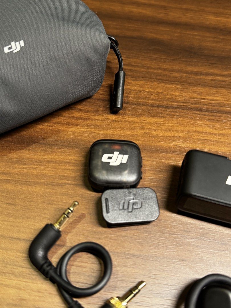 DJI Mic 3 (1 TX + 1 RX) (Category: Microphones) located in Mandaluyong City. Submitted by mjpinedatv (Listing ID 1459224522, Image 2). Description: - DJI Mic wireless microphone system - Includes transmitter, receiver, and charging case - Comes with furry windscreen and USB-C to USB-C cable - Perfect for crystal-clear audio recording - All items neatly stored in the charging case.