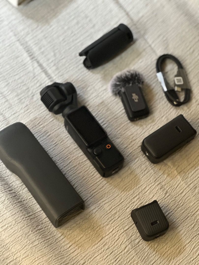 DJI Pocket 2 Creator Combo Gimbal Camera (Category: Cameras) located in Davao. Submitted by twolipsms (Listing ID 1459155351, Image 1). Description: Selling my DJI Osmo Pocket 3 Creator Combo in almost brand-new condition. Very fresh unit with zero scratches and screen protector already installed since day one! From: Official DJI Store (Abreeza Mall, Davao City originally purchased from 37k+) Status: Complete set with original box, all combo incl
