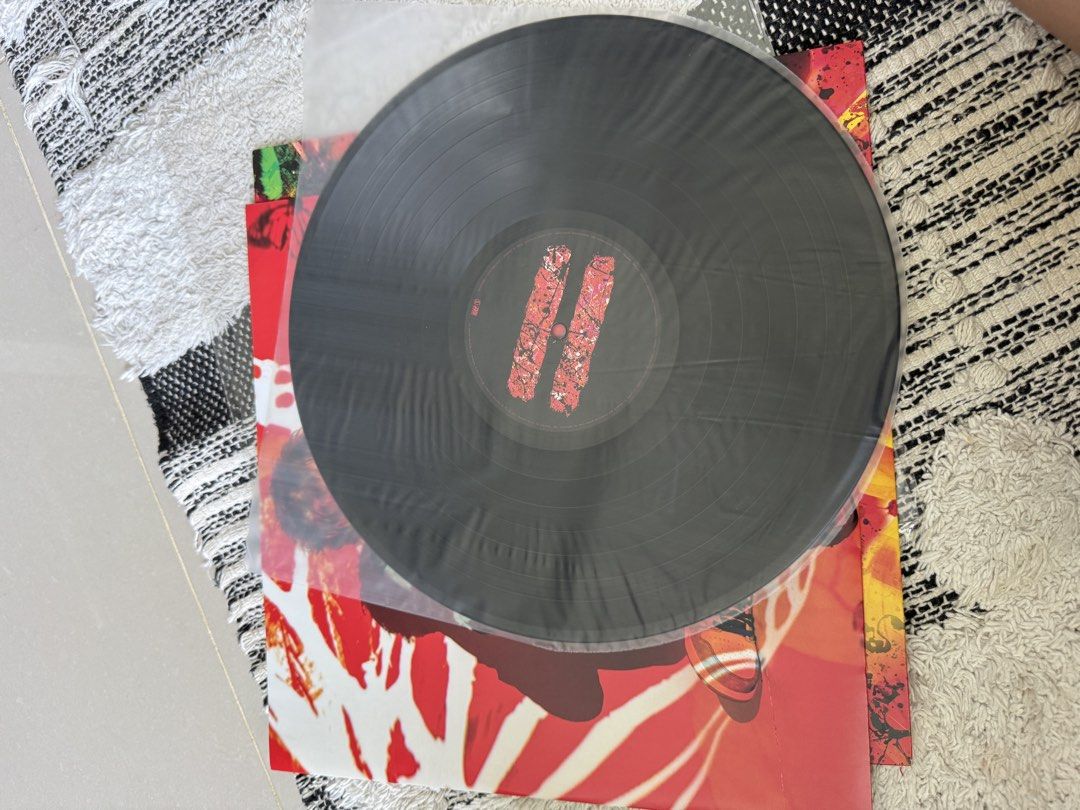 Ed Sheeran Equals Vinyl Record (Category: Vinyls) located in Lapu Lapu. Submitted by thegentleedit.ph (Listing ID 1459181188, Image 3). Description: - Ed Sheeran vinyl record - Full tracklist visible on back cover - Features songs like Tides, Shivers, and Stop The Rain - Near Mint condition - A great addition to any music collection.