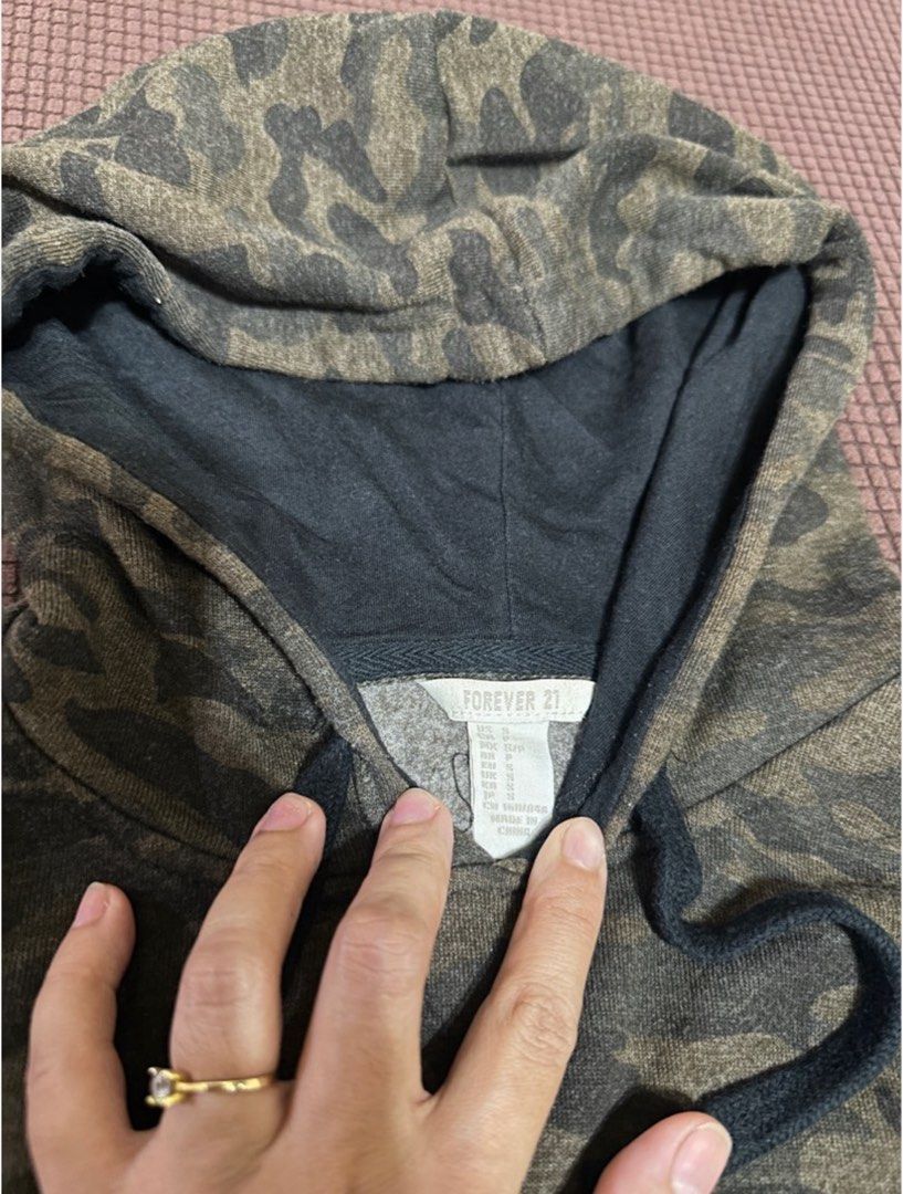 Forever 21 Camouflage Hoodie (Category: Coats, Jackets and Outerwear) located in Manila. Submitted by oja02 (Listing ID 1459242728, Image 3). Description: Forever21 Camou Hoodie Jacket can be crop jacket color: Fatigue/Army green size on tag: US Small with 2 pockets In very good condition Used twice - personal item Thick fabric - super nice in actual Loc: Manila..