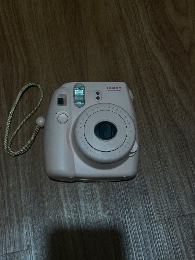 Fujifilm Instax Mini 8 Pink Instant Camera (Category: Cameras) located in Manila. Submitted by tyluvbot (Listing ID 1459198401, Image 3). Description: - Pink Fujifilm Instax Mini 9 camera - Includes wrist strap - Captures memories instantly - Easy to use - Perfect for parties and everyday fun - Get photos developed right away -uses alkaline battery Not guaranteed if working Last used a year ago !!BUY AT YOUR OWN RISK!!.
