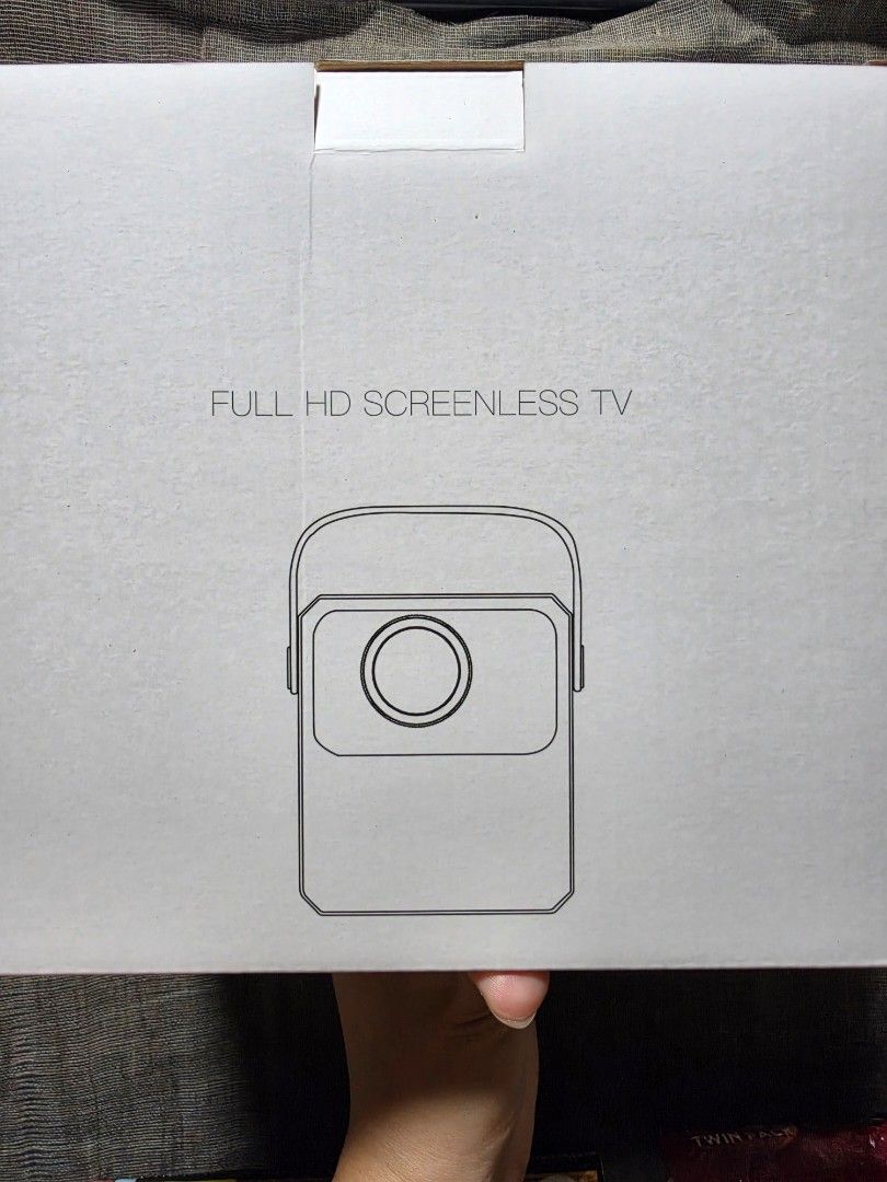 Full HD Screenless TV HD Projector with WiFi, Android (Category: Projectors) located in Valenzuela. Submitted by heatnotburn (Listing ID 1459223221, Image 3). Description: - Full HD Resolution - WiFi & Android Support - USB & TF Card Compatible - Keystone Correction - AUX Out & U Disk Read - Compact & Portable Design - Ideal for Movie Nights & Presentations.