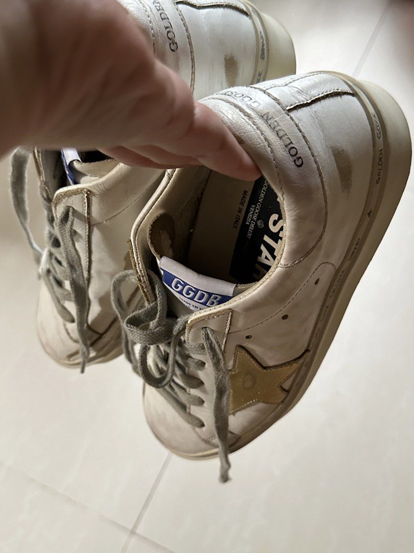 GGBD Hi Star 35 (Category: Sneakers) located in Antipolo. Submitted by ttrends (Listing ID 1459199052, Image 3). Description: - White leather sneakers with iconic gold star - Made in Italy - Pre-loved condition with visible signs of wear on soles and leather - Still has plenty of wear left - Ideal for everyday use size: 35 RFS: outgrown .