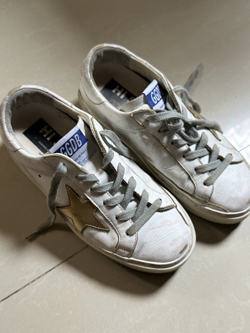 GGBD Hi Star 35 (Category: Sneakers) located in Antipolo. Submitted by ttrends (Listing ID 1459199052, Image 1). Description: - White leather sneakers with iconic gold star - Made in Italy - Pre-loved condition with visible signs of wear on soles and leather - Still has plenty of wear left - Ideal for everyday use size: 35 RFS: outgrown .