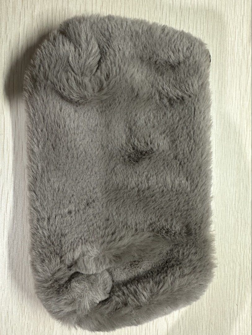 Gray Fur pouch (Category: Purses & Pouches) located in Manila. Submitted by shopkriscloset (Listing ID 1459252425, Image 2). Description: ‼️PLEASE READ BEFORE PLACING AN OFFER: 🩵Please be patient and respectful. 🤗 If I don’t get to reply immediately, I might be working. 🧡Please REFRAIN from making an offer if you do not intend to complete the purchase‼️ 🧡Kindly read the description for more details on shipping and the product itself to preven