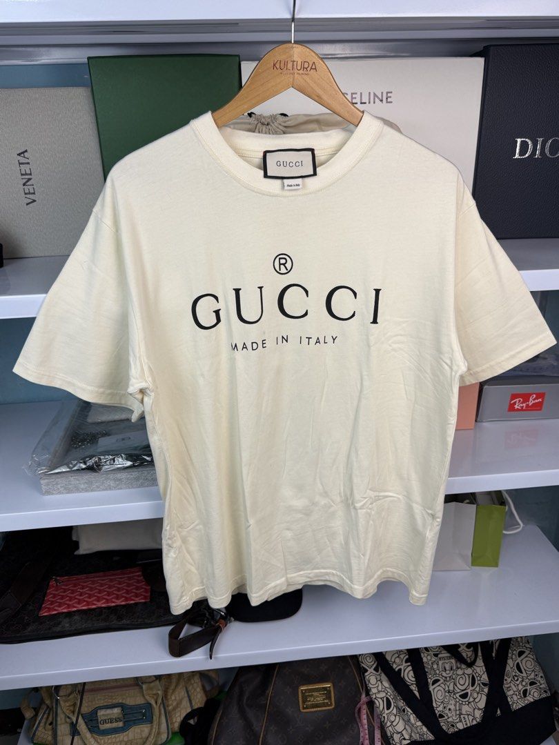 GUCCI (Category: Tshirts & Polo Shirts ) located in Quezon City. Submitted by generalmerchandiseph (Listing ID 1459247708, Image 3). Description: - GUCCI CLASSIC LOGO PRINT - HEAVY MATERIAL - BEEFY NECKLINE - COMPLETE TAGS AND WASHTAGS - 21W X 27L DIMENSIONS - PRISTINE USED CONDITION - WASHED AND READY TO WEAR 🫧.