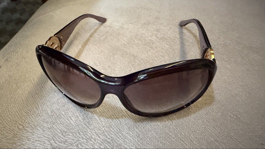 Gucci Sunglasses (Category: Sunglasses & Eyewear) located in Makati City. Submitted by genuinelygoods (Listing ID 1459119407, Image 3). Description: - Authentic Gucci sunglasses - Oversized frame with purple tint - Iconic GG logo on the sides - Gradient lenses - Perfect for sunny days - Comes with original case - Purple.