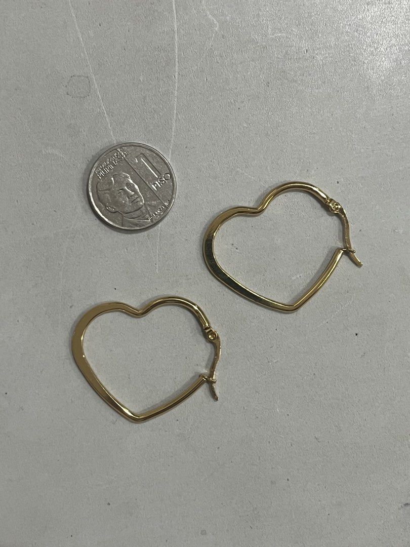 HEART-SHAPED GOLD HOOP EARRINGS (Category: Earrings) located in Quezon City. Submitted by zia_renee (Listing ID 1459205817, Image 3). Description: » cute, hearts, chic ! » adorable and novelty design .𖥔 ݁ » condition: 9.5/10 .ᐟ⁀➴ flaws: faint buffing ☆.