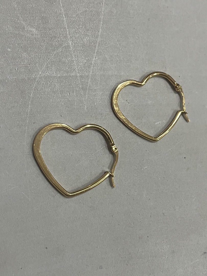 HEART-SHAPED GOLD HOOP EARRINGS (Category: Earrings) located in Quezon City. Submitted by zia_renee (Listing ID 1459205817, Image 2). Description: » cute, hearts, chic ! » adorable and novelty design .𖥔 ݁ » condition: 9.5/10 .ᐟ⁀➴ flaws: faint buffing ☆.