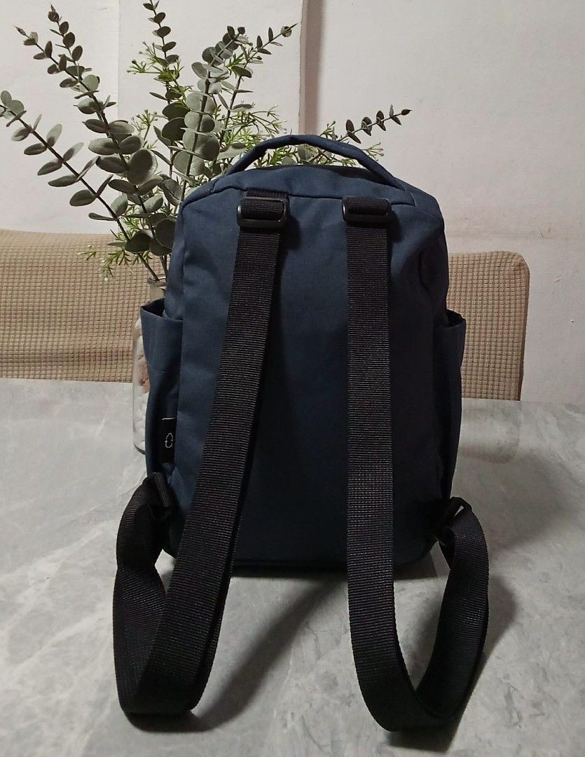 hellolulu Navy Blue Backpack (Category: Backpacks) located in Manila. Submitted by cosmiccloud-9236 (Listing ID 1459119619, Image 2). Description: - Navy blue hellolulu backpack - Front flap pocket and side pockets - Two main compartments with zip closure - Adjustable straps for comfort - Durable material - Ideal for daily use or travel.