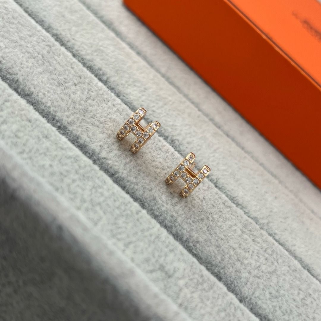 Hermes outlet mini H Earrings (Gold & Silver) (Category: Earrings) located in San Juan City. Submitted by zenocean-f9dfa7 (Listing ID 1459192084, Image 1). Description: - Authentic Hermes outlet H Earrings - Available in Gold and Silver tones - Encrusted with small stones - Made in France - Comes with original box - Ideal for everyday wear or special occasions - SF Express offers free shipping and cash on delivery.
