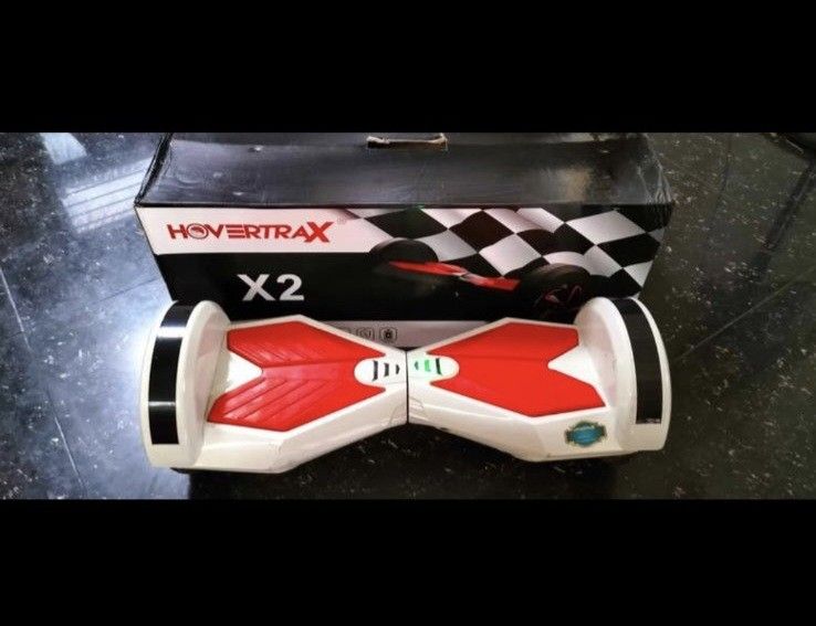 Hovertrax X2 Hoverboard with Box (Category: Skates, Rollerblades & Scooters) located in Manila. Submitted by fastpenguin.445463 (Listing ID 1459148788, Image 1). Description: - Hovertrax X2 hoverboard - Original box included - Red and white design - Lights up on the sides - Perfect for cruising - Ready for a new owner.