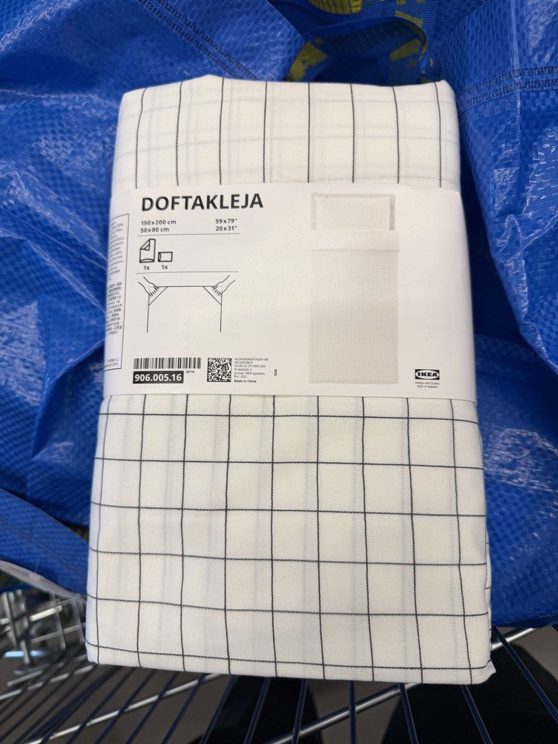 IKEA DOFTAKLEJA Duvet Cover Set (Category: Bedding & Towels) located in Quezon City. Submitted by goodthriftsby9 (Listing ID 1459159762, Image 1). Description: - Brand new IKEA DOFTAKLEJA duvet cover set - Size: Twin (Duvet: 150 x 200 cm, Pillowcase: 50 x 80 cm) - Design: Classic white with a clean black grid pattern - Condition: Brand new, still in original packaging - Perfect for a minimalist and modern bedroom aesthetic - Original price 1499 b