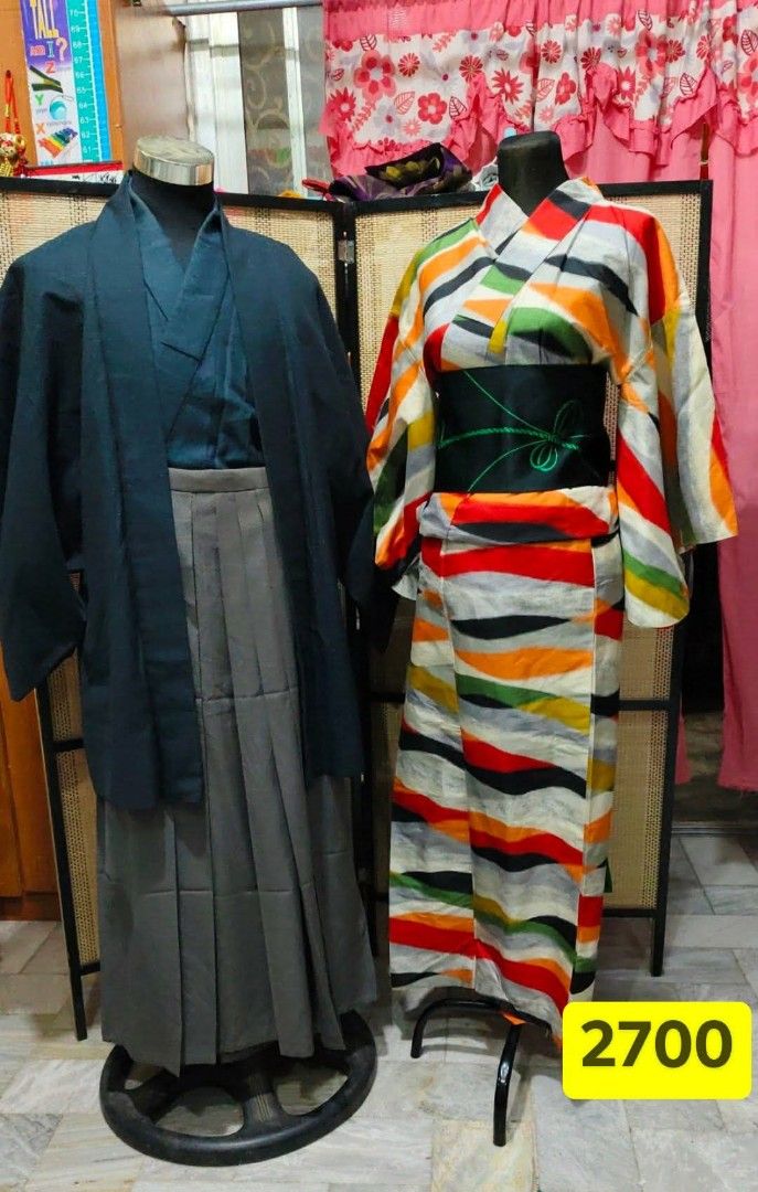 japanese couple set preloved (Category: Sets & Coordinates) located in Paranaque City. Submitted by kimono_sisters27 (Listing ID 1459200871, Image 1). Description: - Preloved Japanese couple set - Men's traditional attire: Dark blue haori and grey hakama - Women's kimono: Vibrant multi-colored stripes with a black obi - Authentic cultural wear - Great preloved condition.