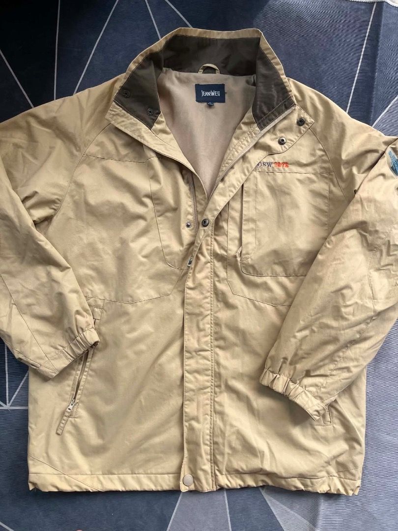 Jeanwest Khaki Jacket with Embroidered Logo (Category: Coats, Jackets and Outerwear) located in Caloocan City. Submitted by villathrift (Listing ID 1459103171, Image 1). Description: - Brand: Jeanwest - Color: Khaki - Closure: Zip and button - Pockets: Two chest pockets, two side pockets - Features: Embroidered logo on chest - Ideal for: Outdoor activities, casual wear - Qualities: Comfortable, durable.
