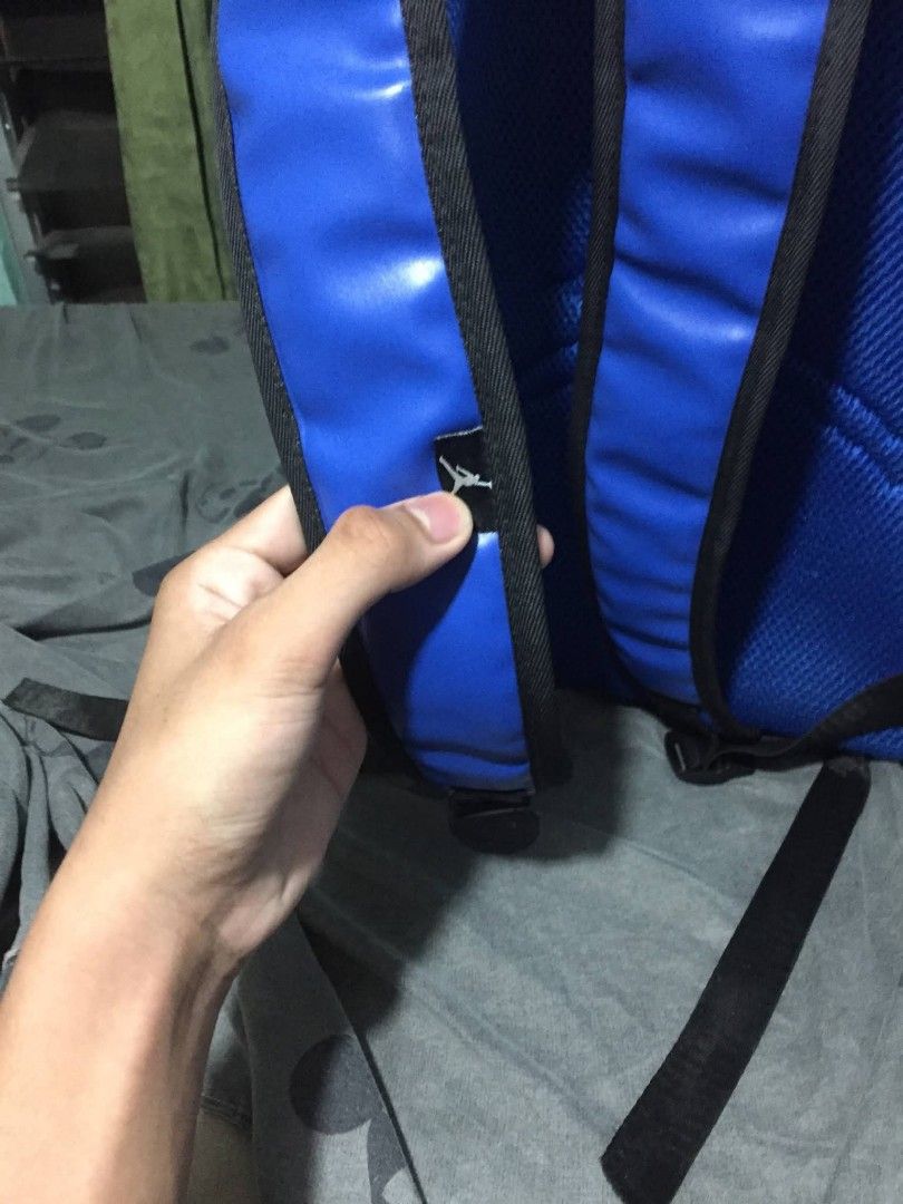 Jordan Backpack Blue and White (Category: Backpacks) located in Taguig. Submitted by mark_antaran (Listing ID 1459097397, Image 2). Description: - Stylish blue Jordan backpack with white accents - Iconic Jumpman logo on the front - Spacious main compartment with internal organization pockets - Comfortable padded shoulder straps - Perfect for school, gym, or everyday adventures - Shows minor signs of wear, but plenty of life left!.