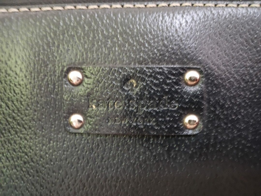 Kate Spade Black Leather Tote Bag (Category: Tote Bags) located in Binangonan. Submitted by chingtp (Listing ID 1459097231, Image 3). Description: - Genuine black leather Kate Spade tote bag (15"×9") - Classic design with elegant white stitching Flaws: -please see #9-#10 photos -needs interior cleaning .